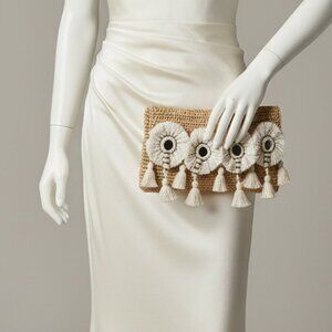 4. FLORA BELLA New Hilo Crochet Clutch Bag in Natural - Lilly Pulitzer